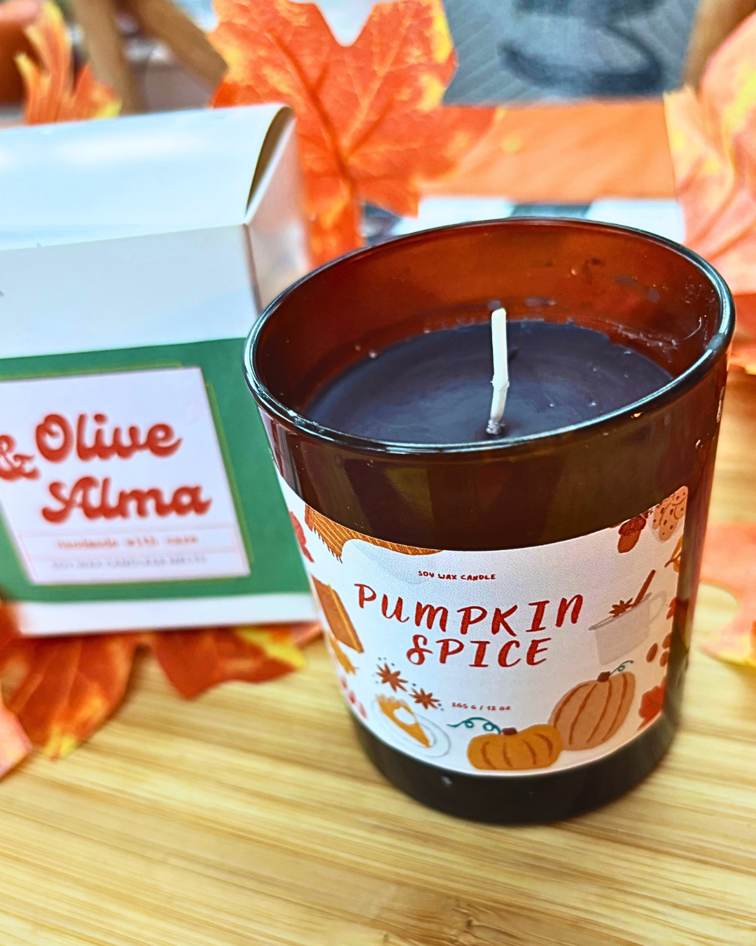 pumpkin spice container candle in amber jar