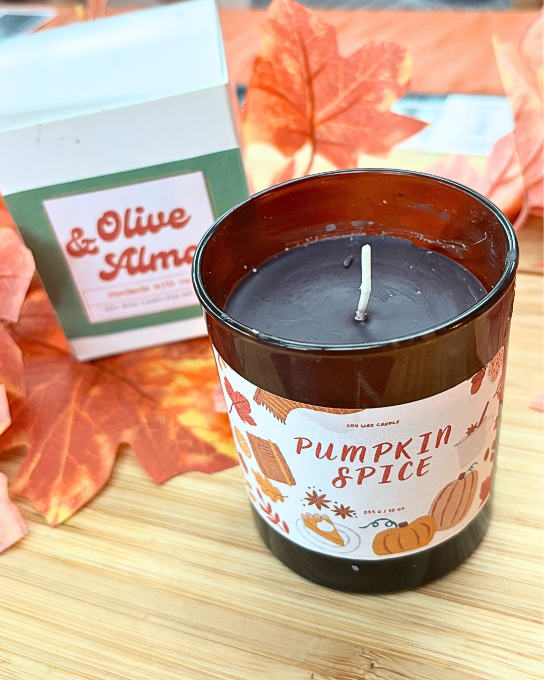 pumpkin spice container candle in amber jar