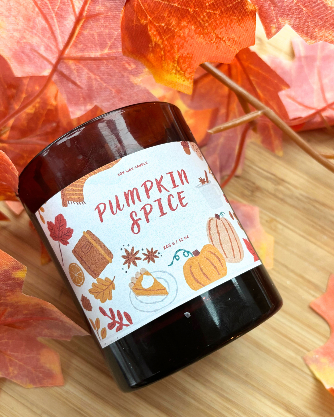 pumpkin spice container candle in amber jar