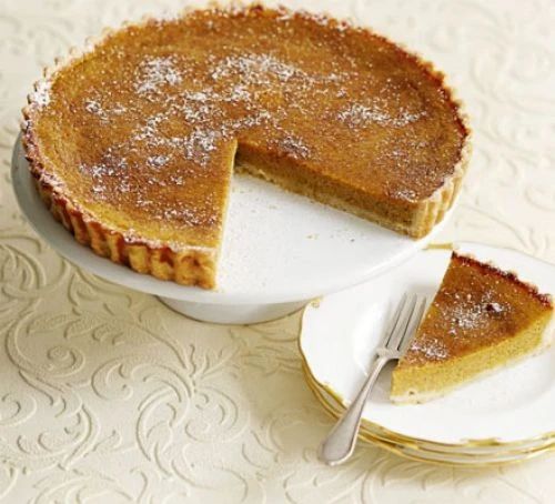 Classic pumpkin pie with pecan & maple cream